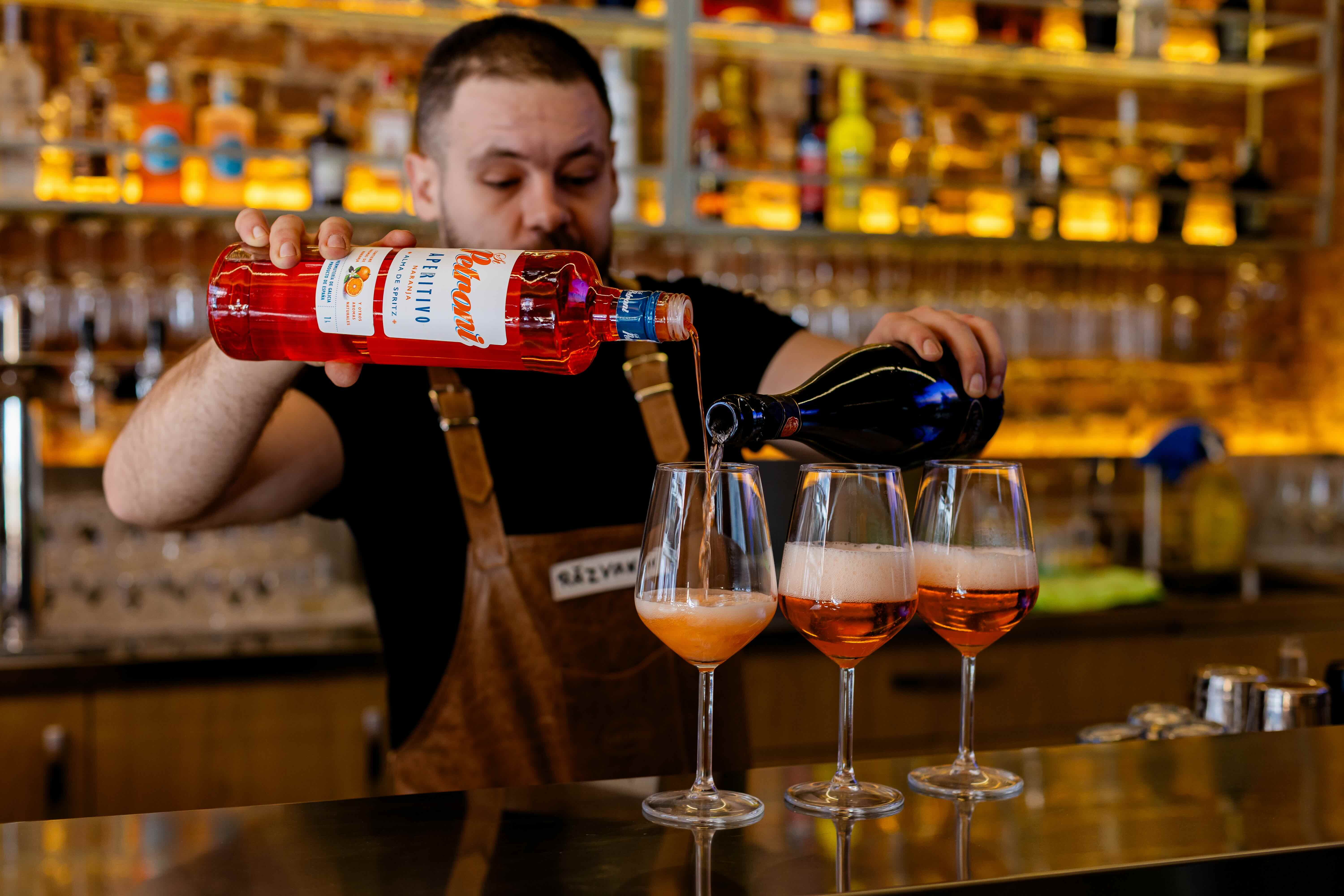 Bartender pouring aperitivo